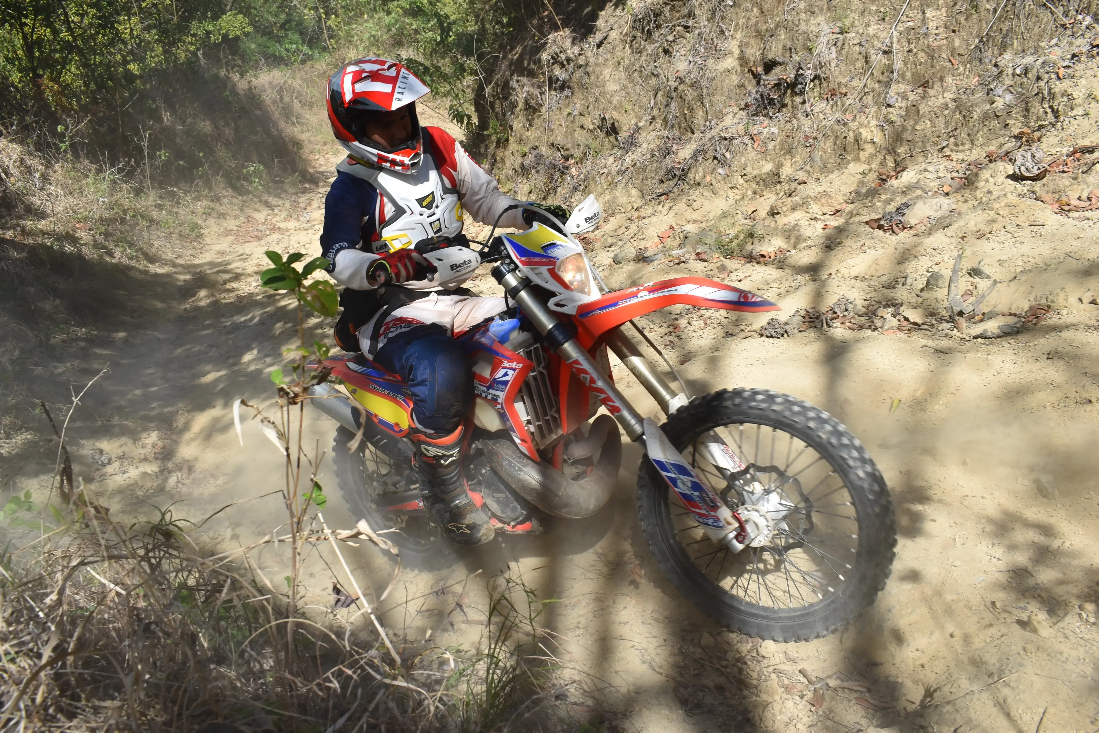 A picture of a motorcycle rider on a mountain trail in Panama.